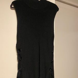 Black mock neck sweater with ties on side
